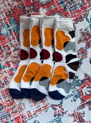 Light-colored spotted socks